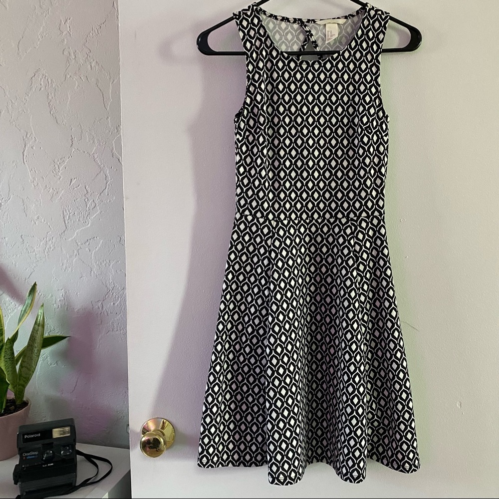 Black and white patterned back cutout dress. Size small.